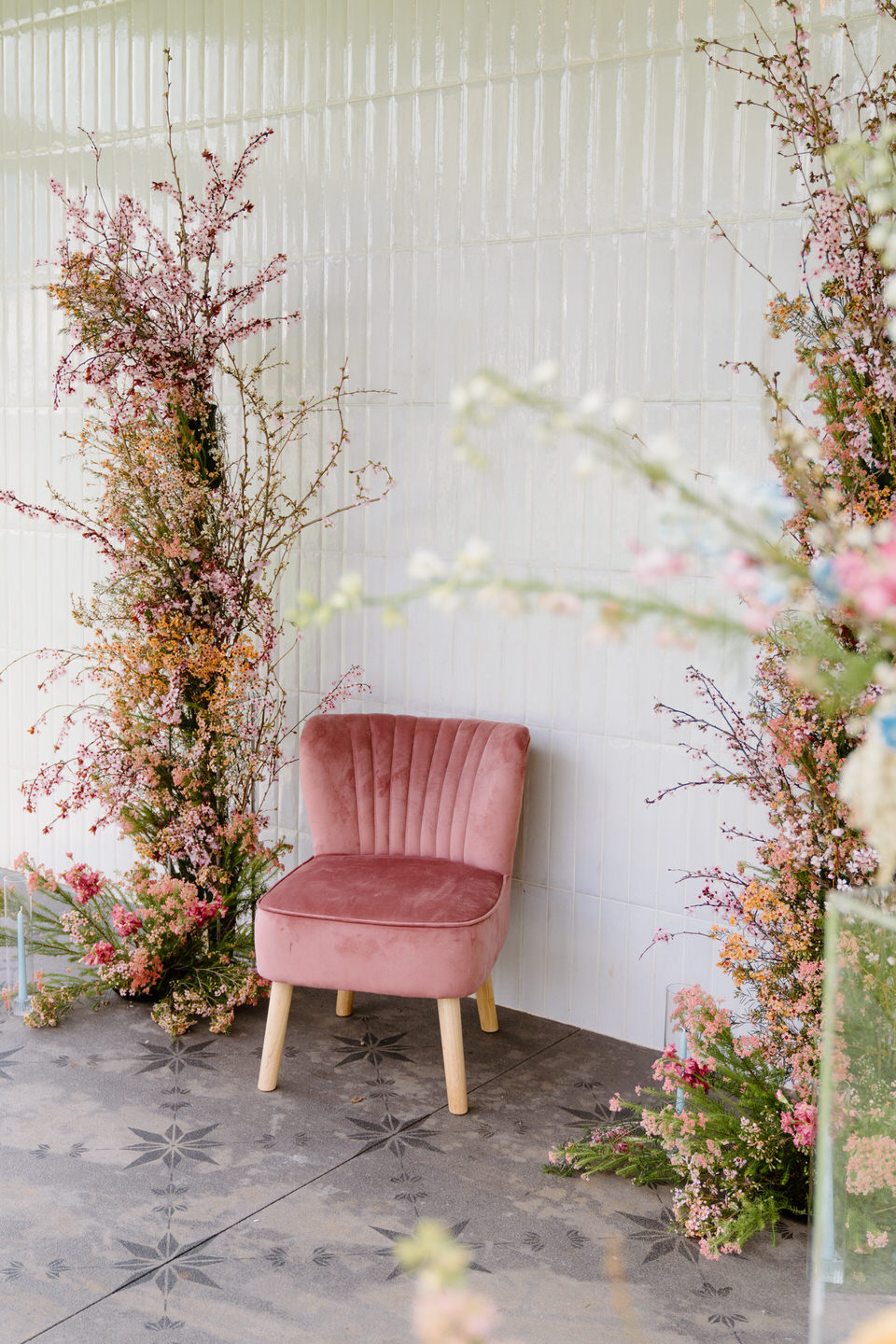 The pink chair from Oregon Elevated Events adds elegance and height variety to bridal portraits.
