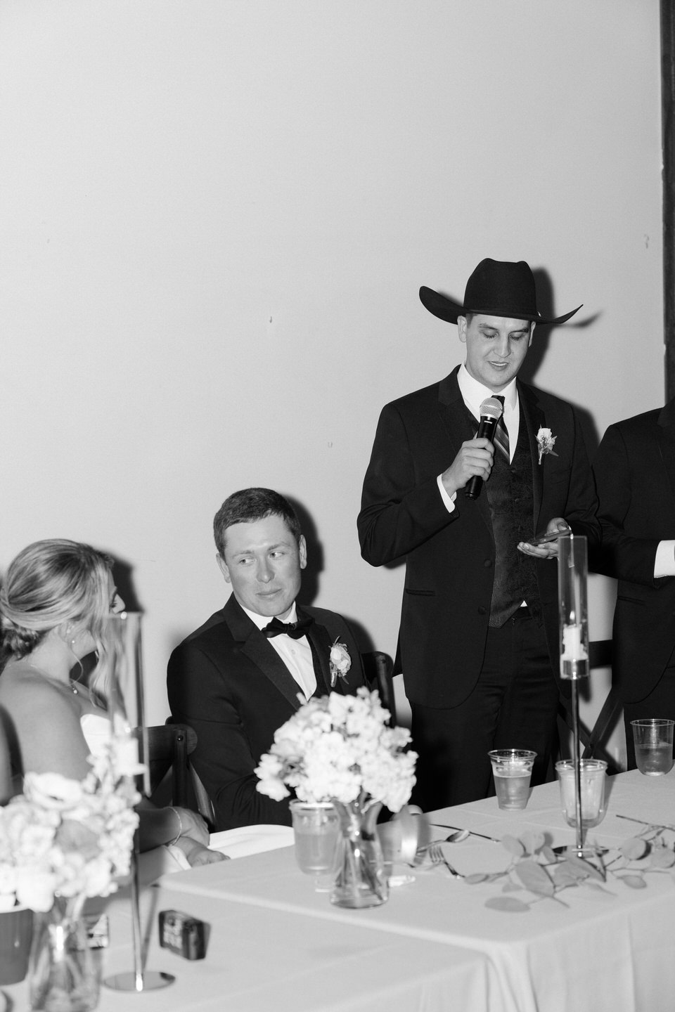 Best man gives an emotional speech during wedding reception.