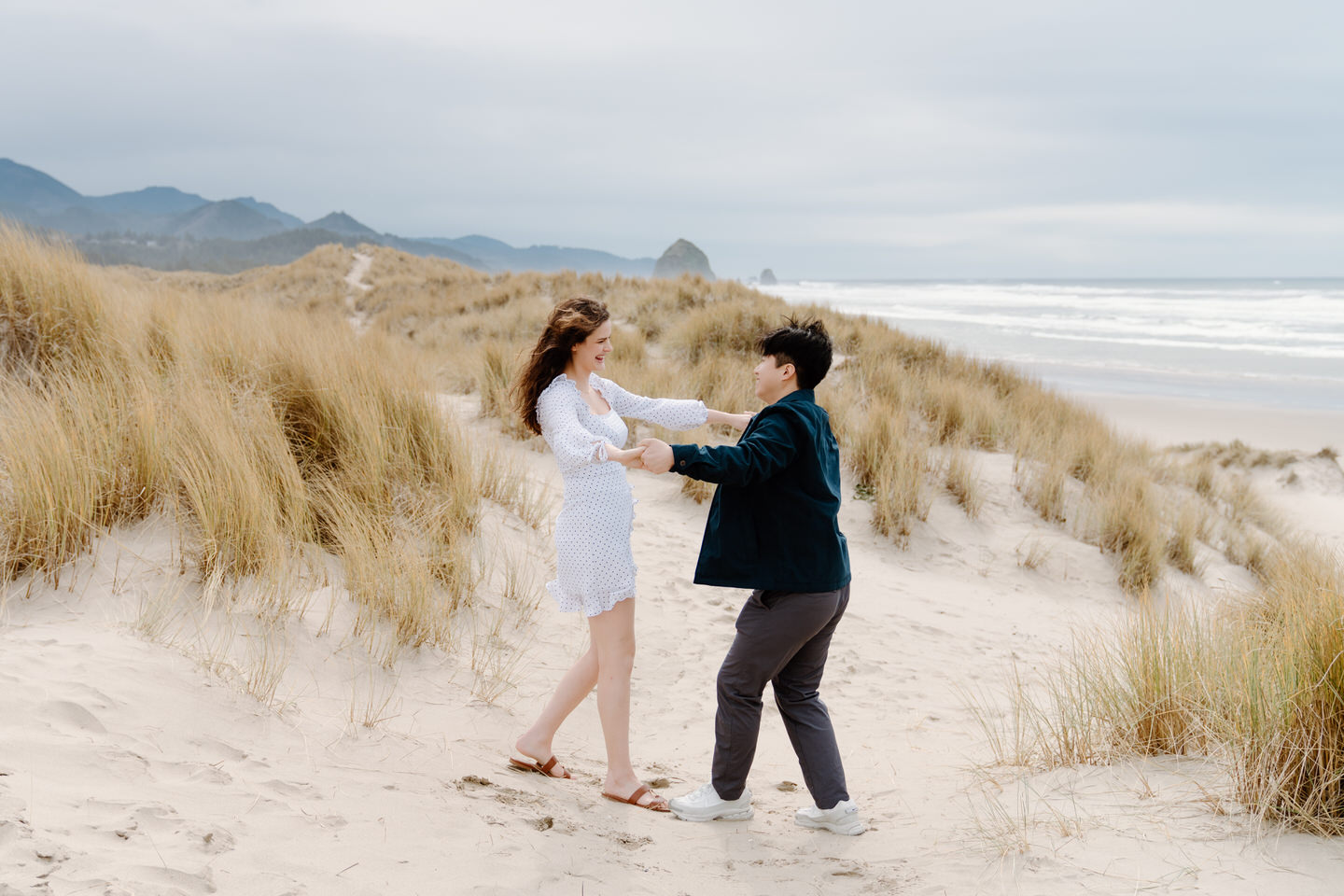 Natural engagement photo in Oregon with romantic and coastal scenery.