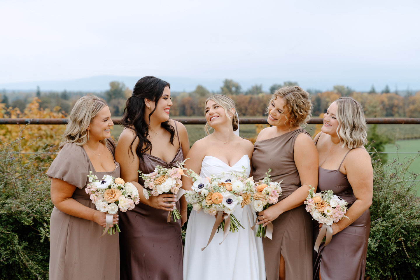 Bridesmaids in fall neutral colors at The Barn at Countryside wedding.
