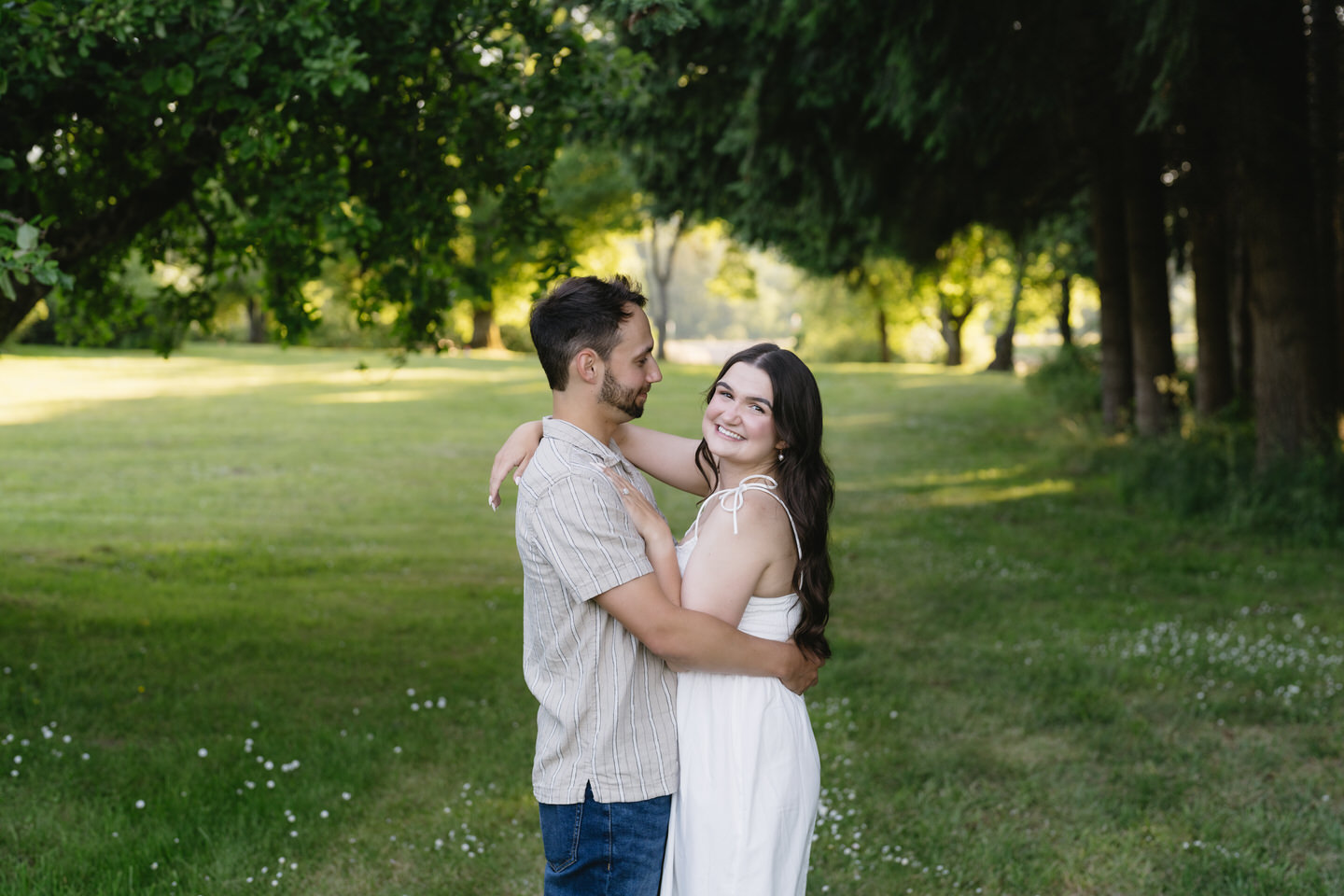 Portland, Oregon engagement photos with neatly cut grass.