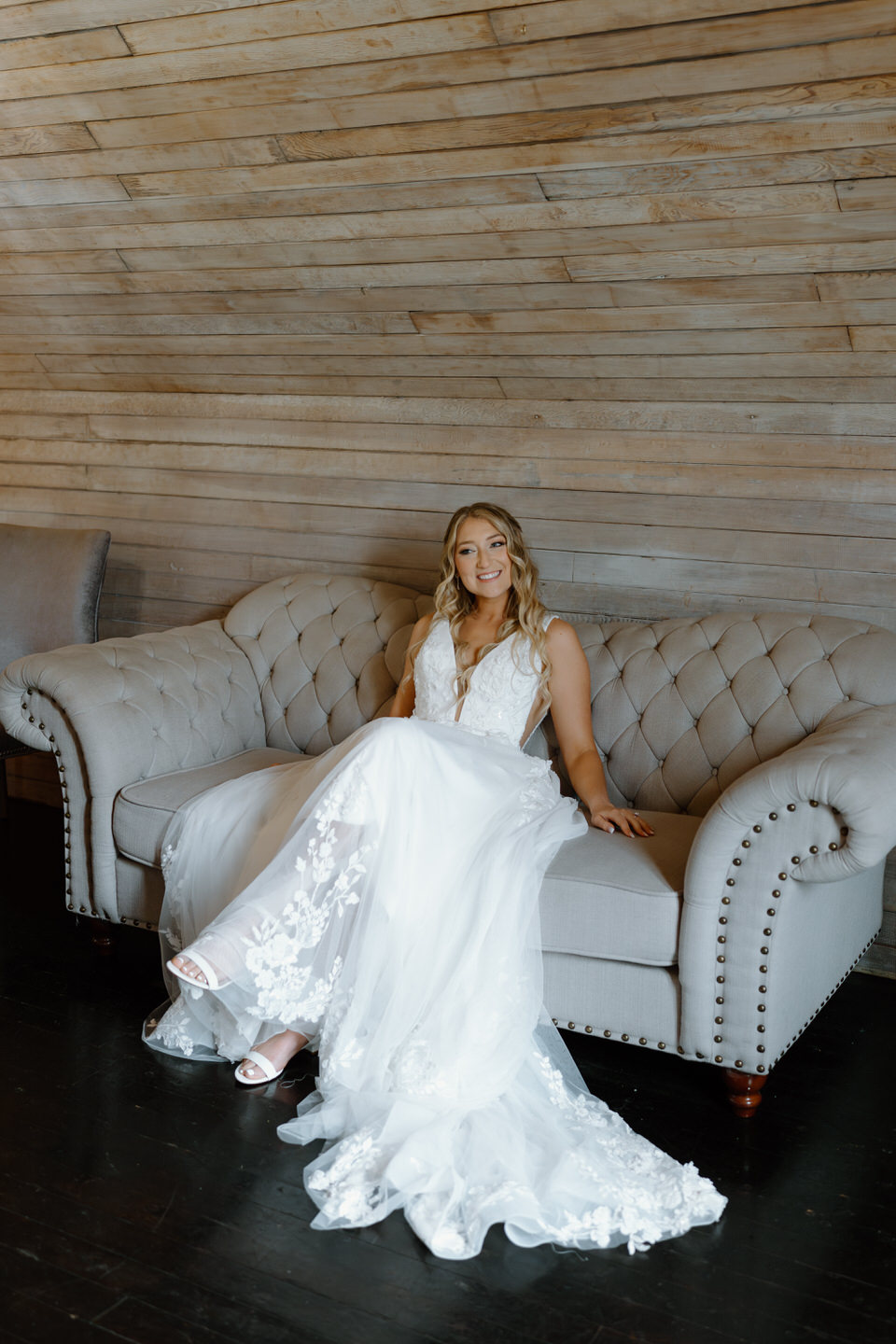 Bride relaxes in the bridal suite at Cape Horn Estate before wedding festivities begin.