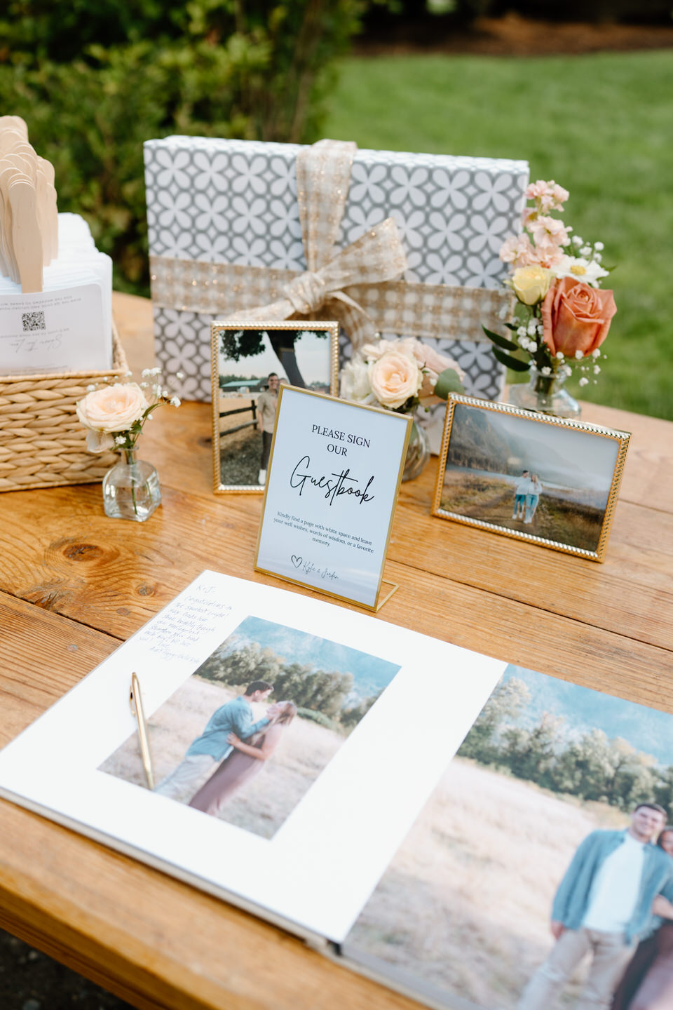 Welcome table with guestbook, gifts, and cards.
