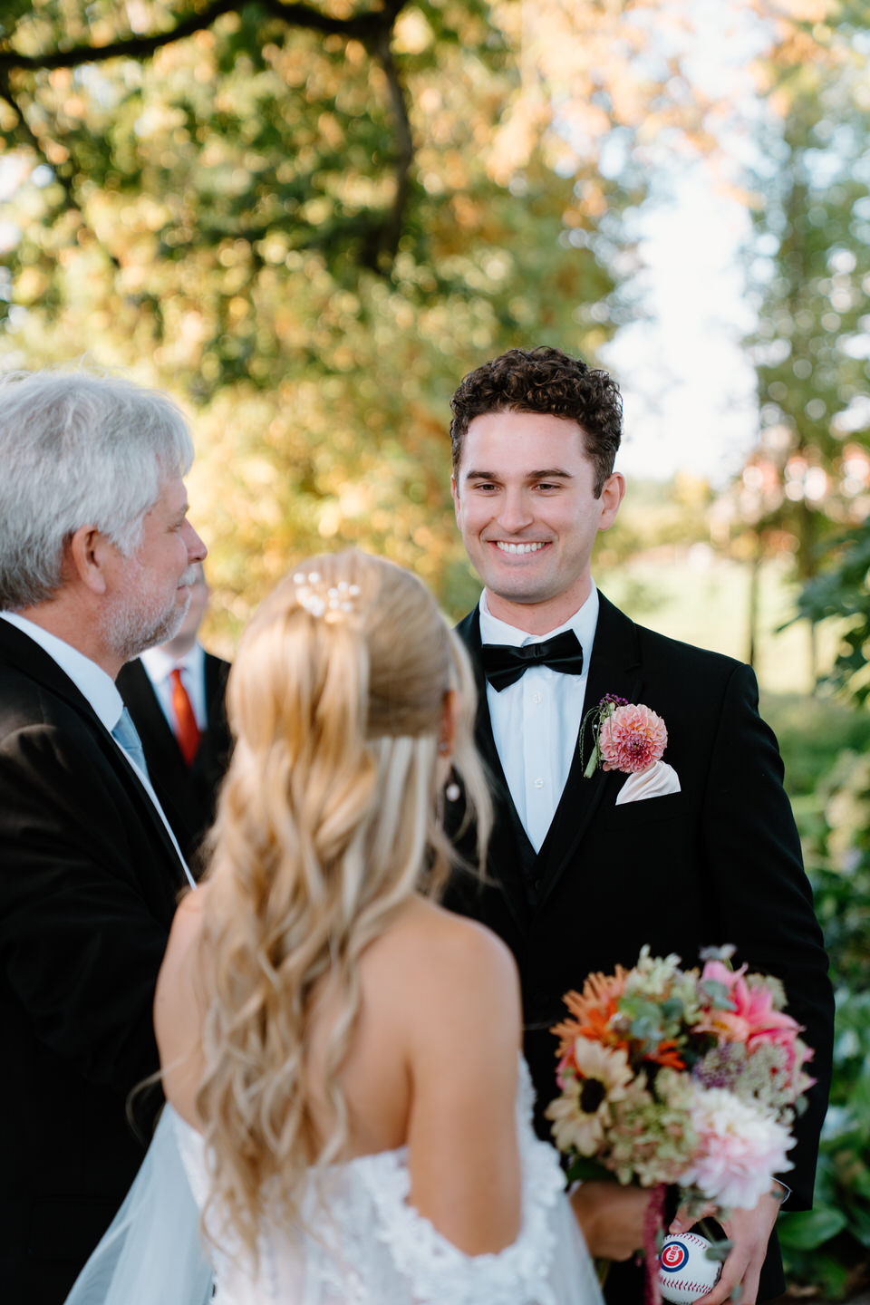 Groom sees his bride for the first time on their wedding day at Postlewaits.