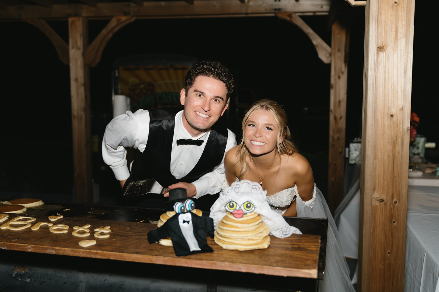 Bride and groom late night bite pancakes.