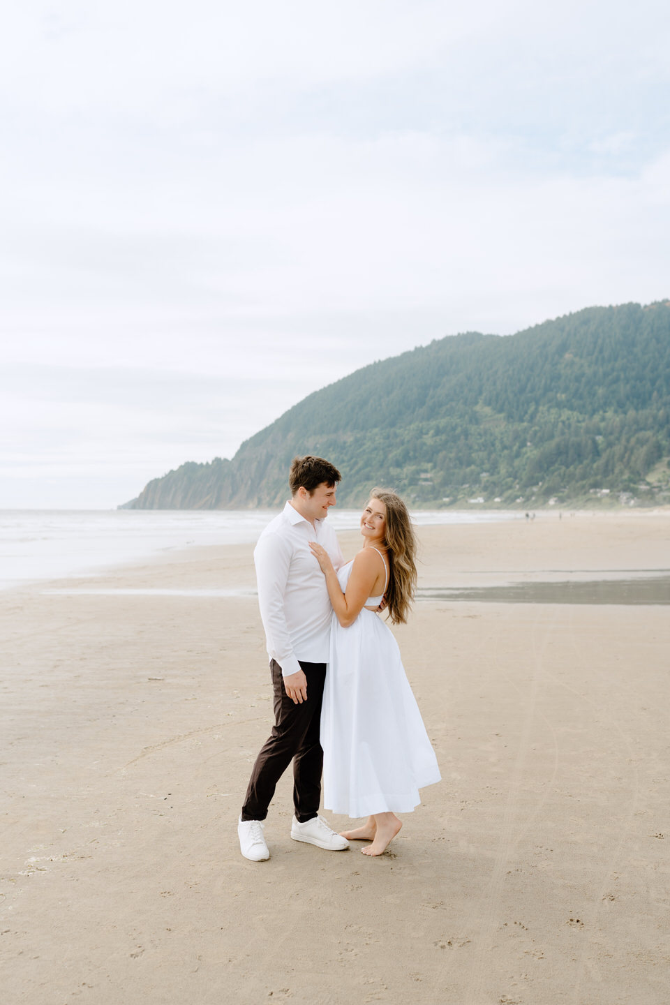 Manzanita engagement session with couple on the beach.