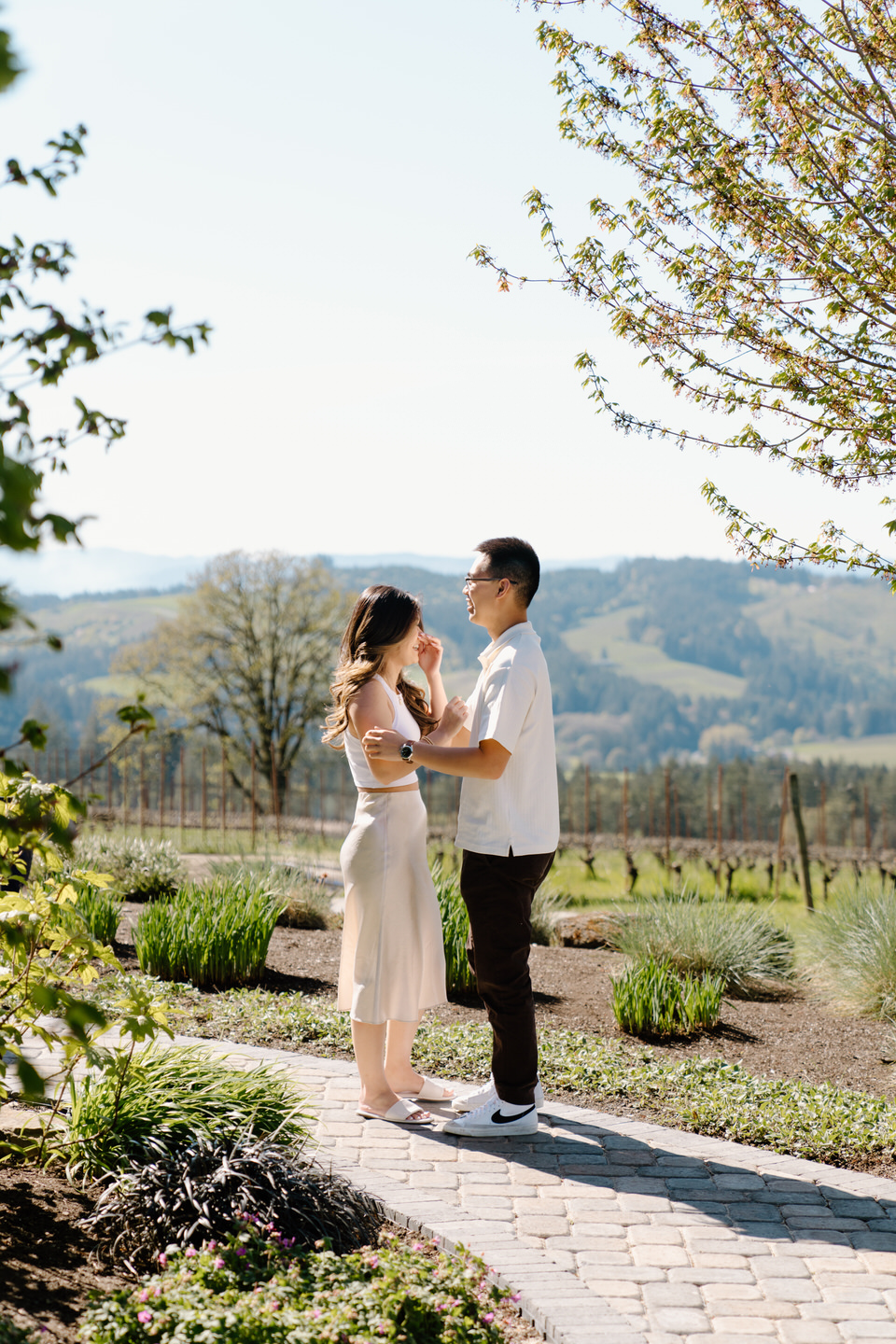 Proposal sequence at Eminent Domaine winery capturing the moment just before and after she says yes.