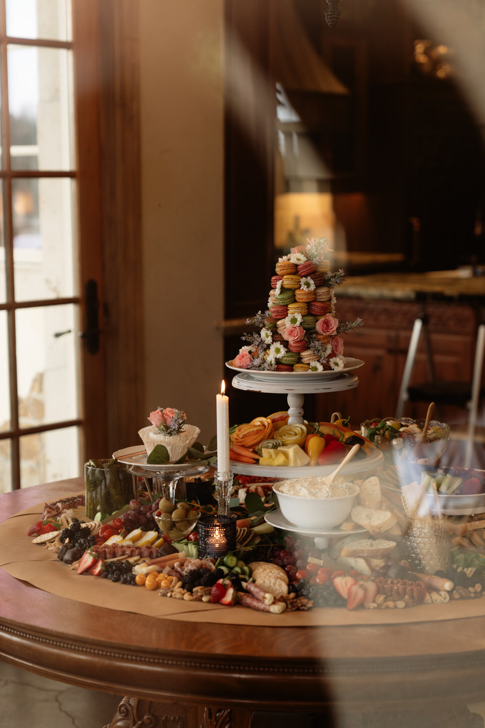Dessert display at Chateau de Lis featuring colorful pastries and elevated spring wedding details.