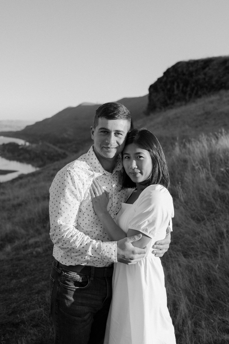 Black and white photo with shadows cast across the couple.