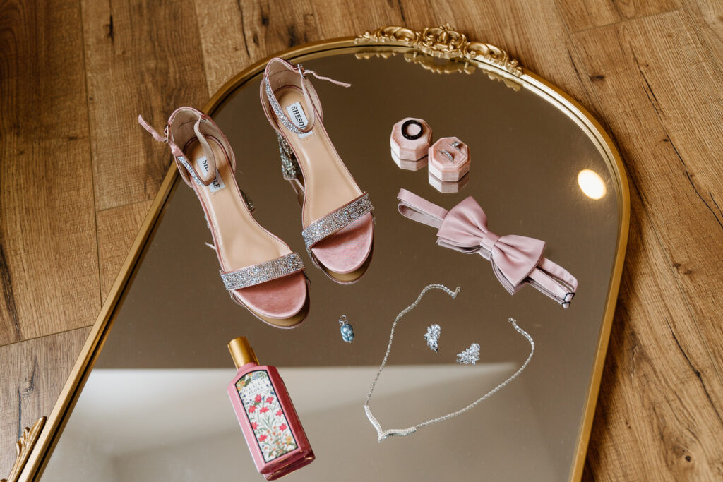 Blush wedding details on mirror
