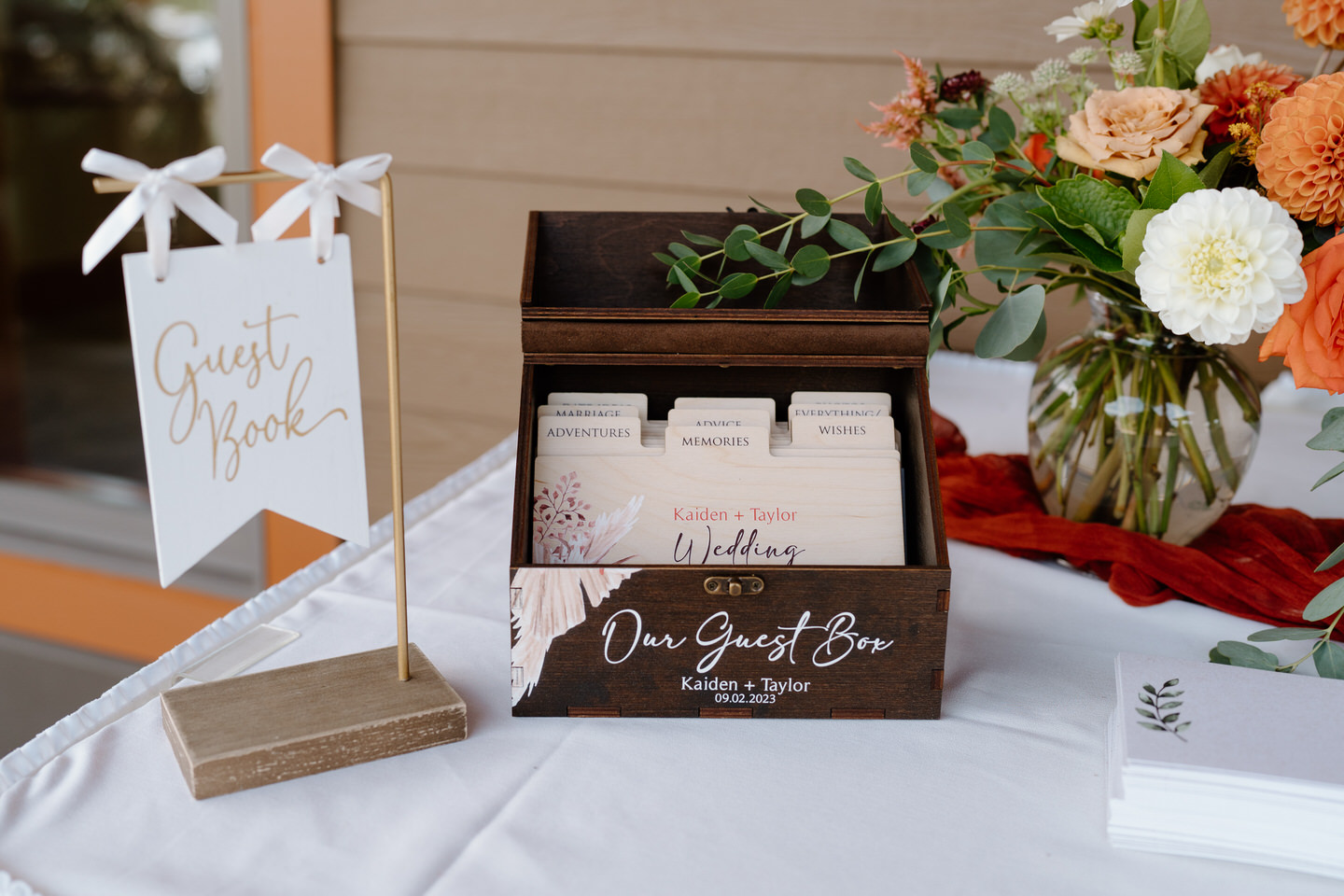 Wedding decor on entry table with guest book