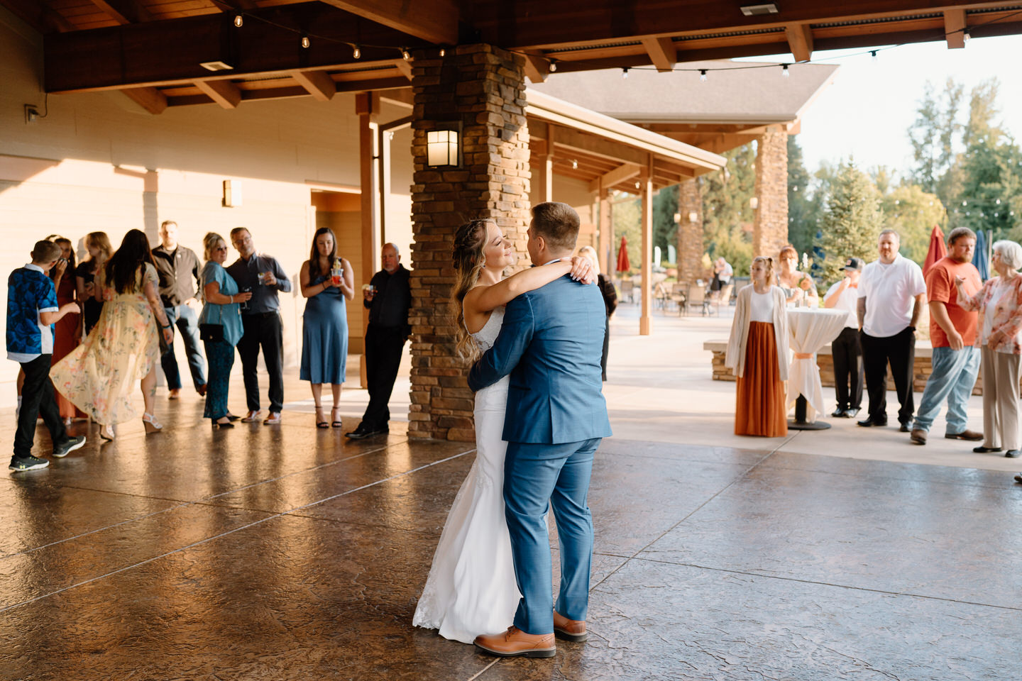 Bride and groom's first dance under the covered patio at shadow hills country club