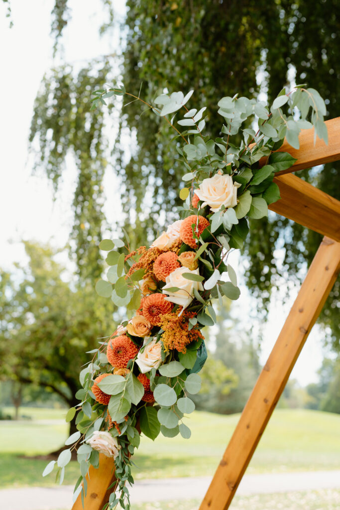 Florals used to decorate the arch at a shadow hills country club wedding