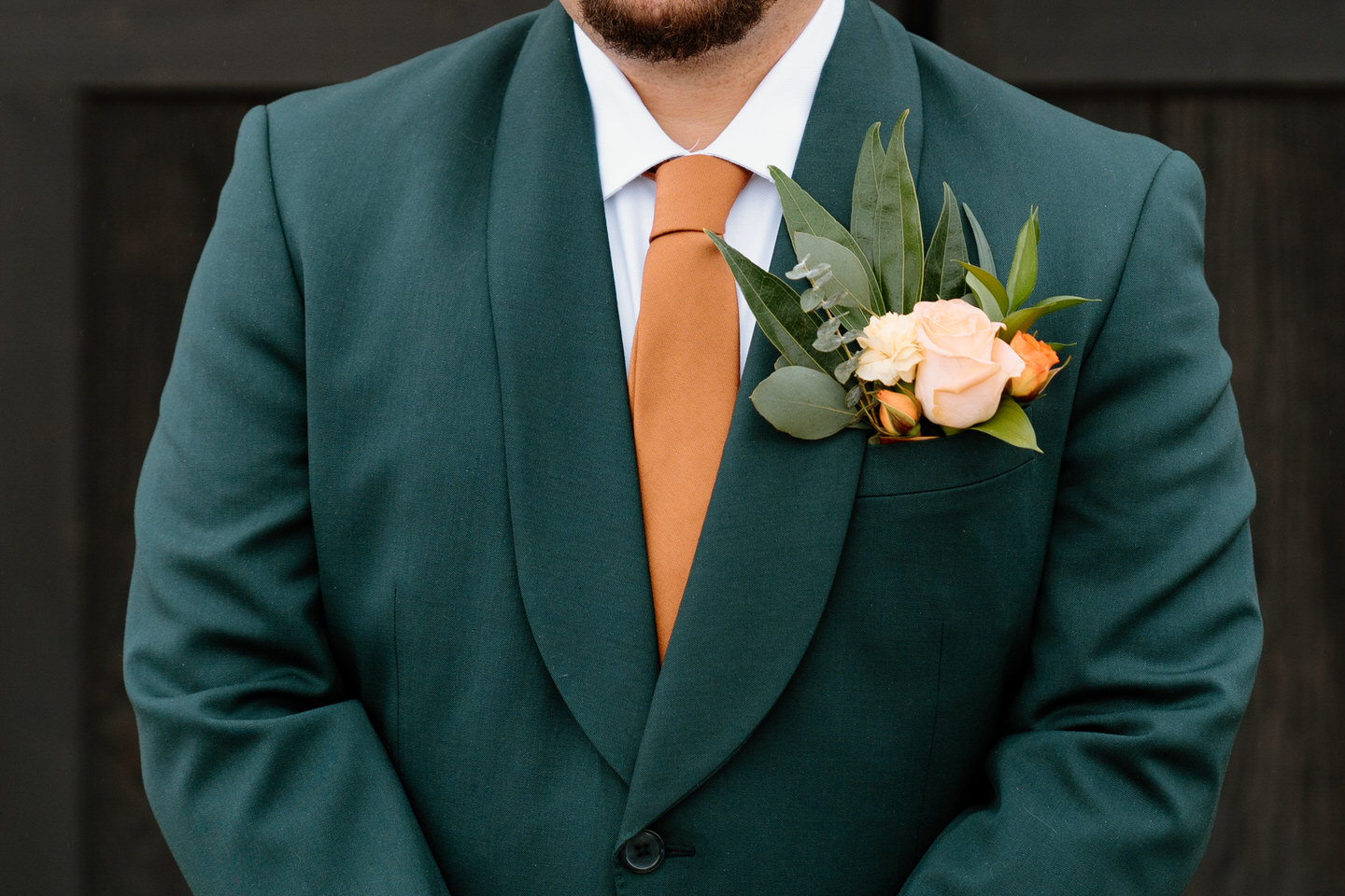 Fall groom attire, suit, tie, and boutonniere