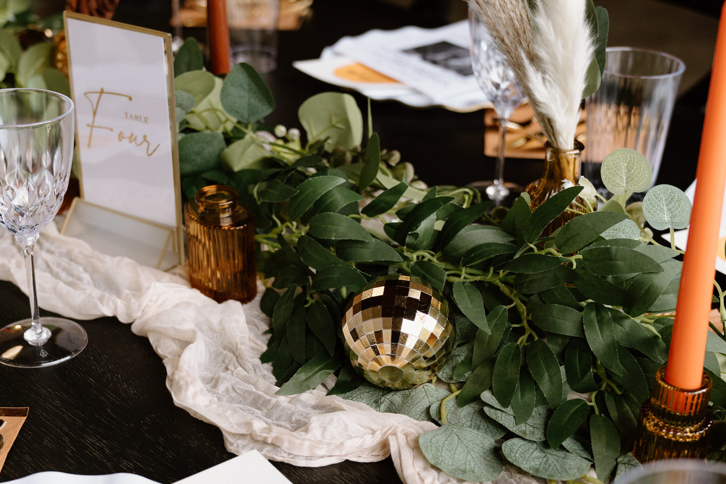 disco ball and eucalyptus wedding table decorations
