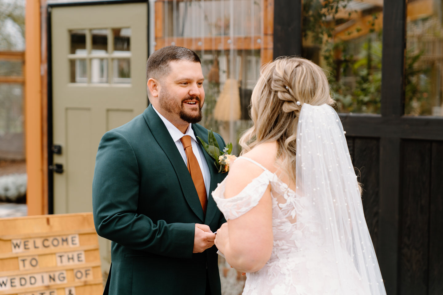 Groom reading private vows during first look at Mt Hood Center