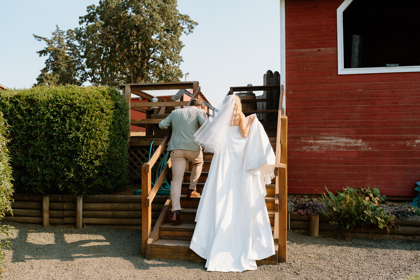 bride and groom exiting ceremony at rustic barn wedding venue