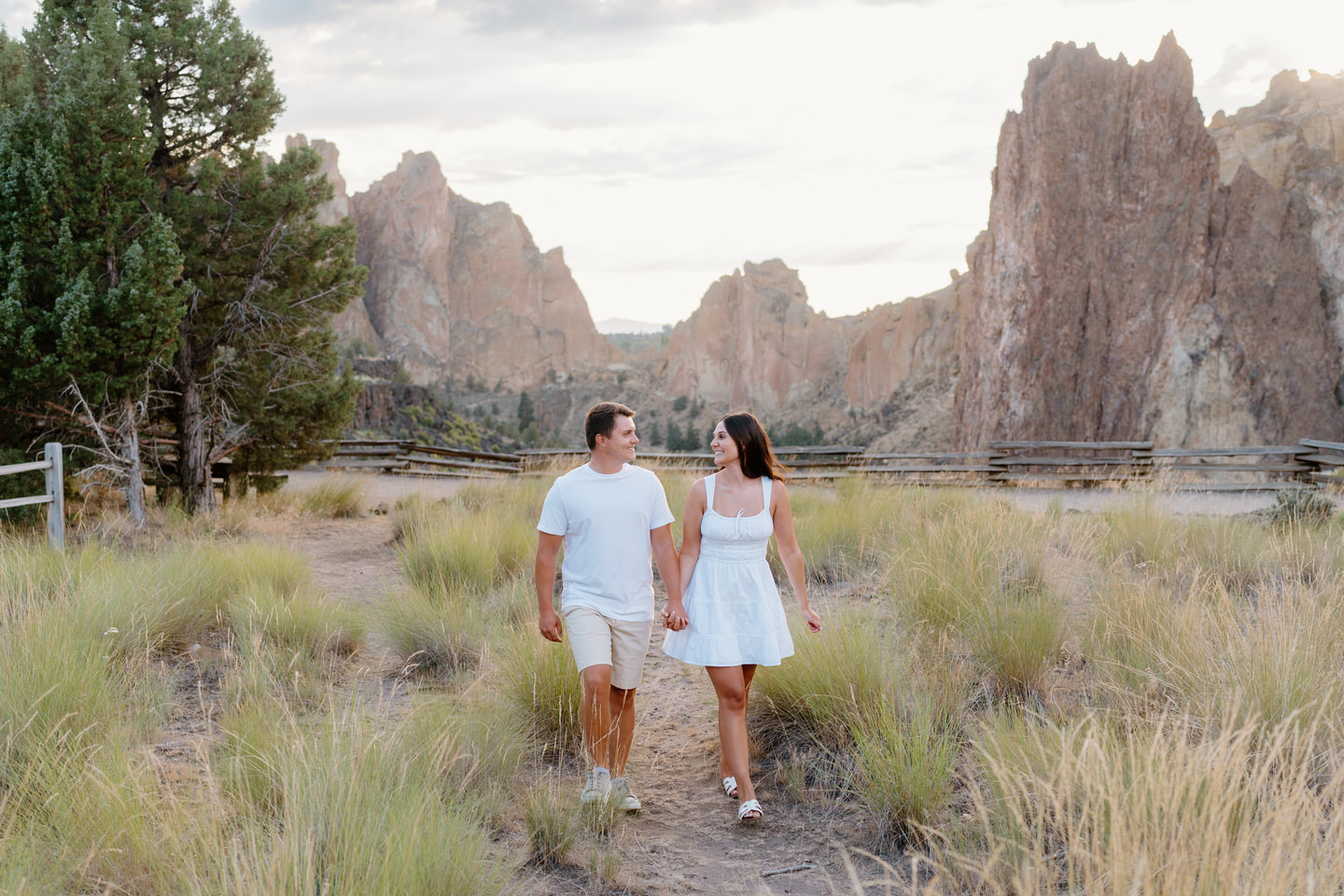 white dress and light outfits for engagement photos