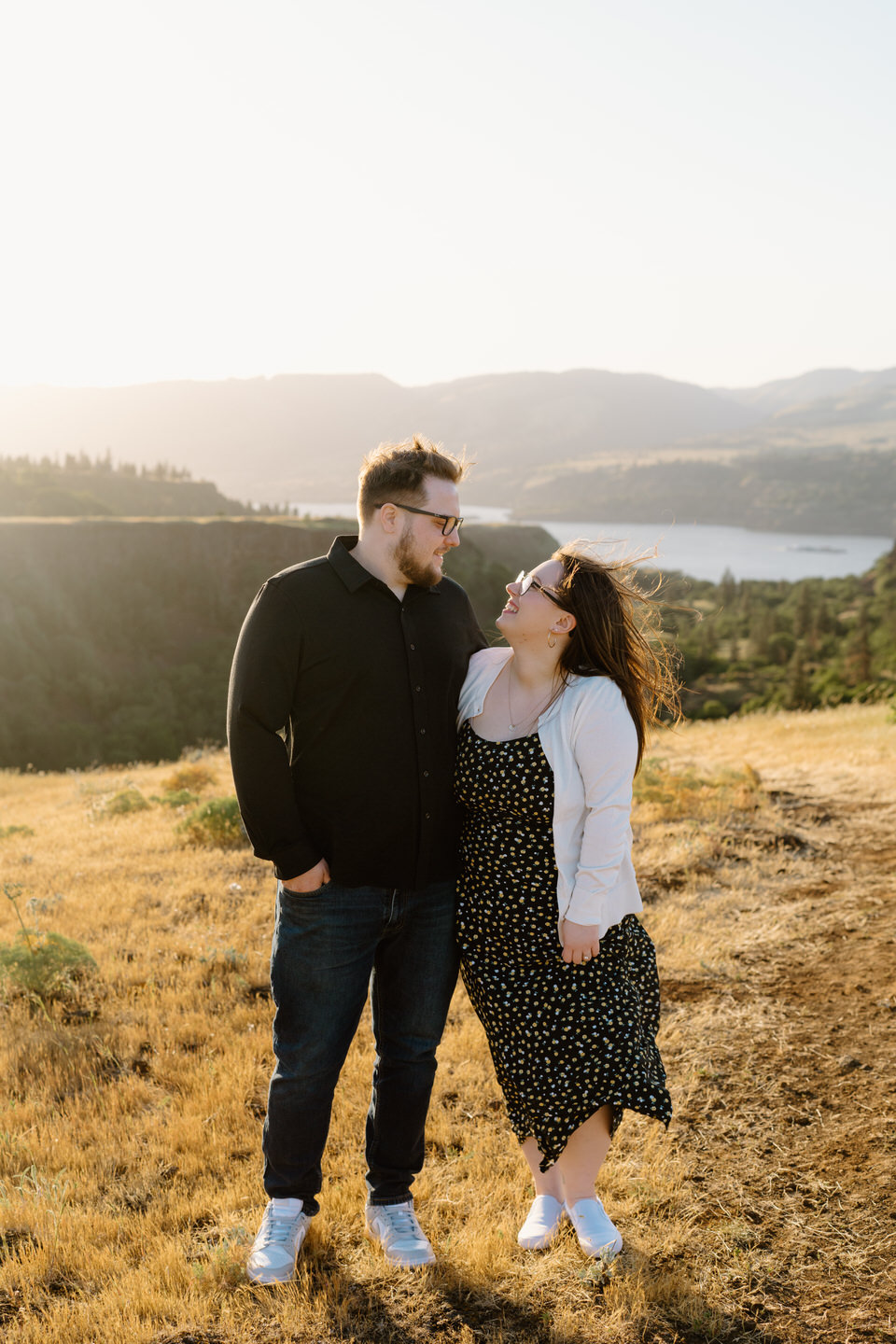 columbia gorge wildflower engagement session with windy hair
