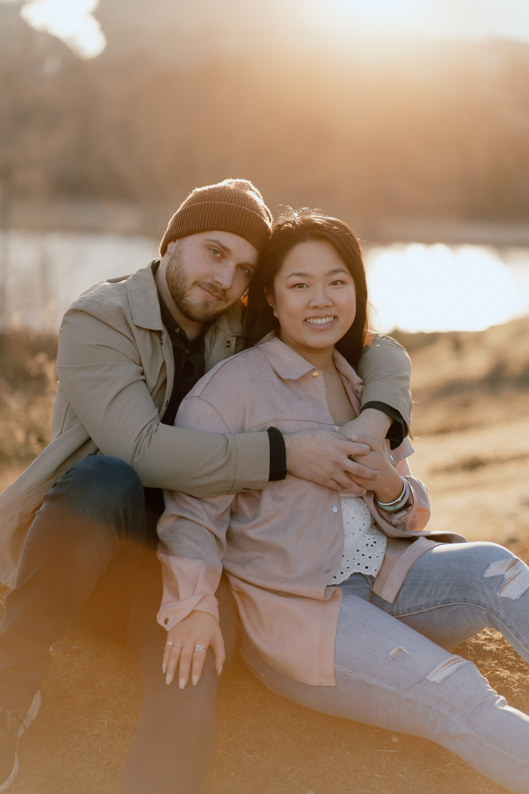 Couple wraps arms around each other for Oregon engagement session in the Columbia River Gorge.