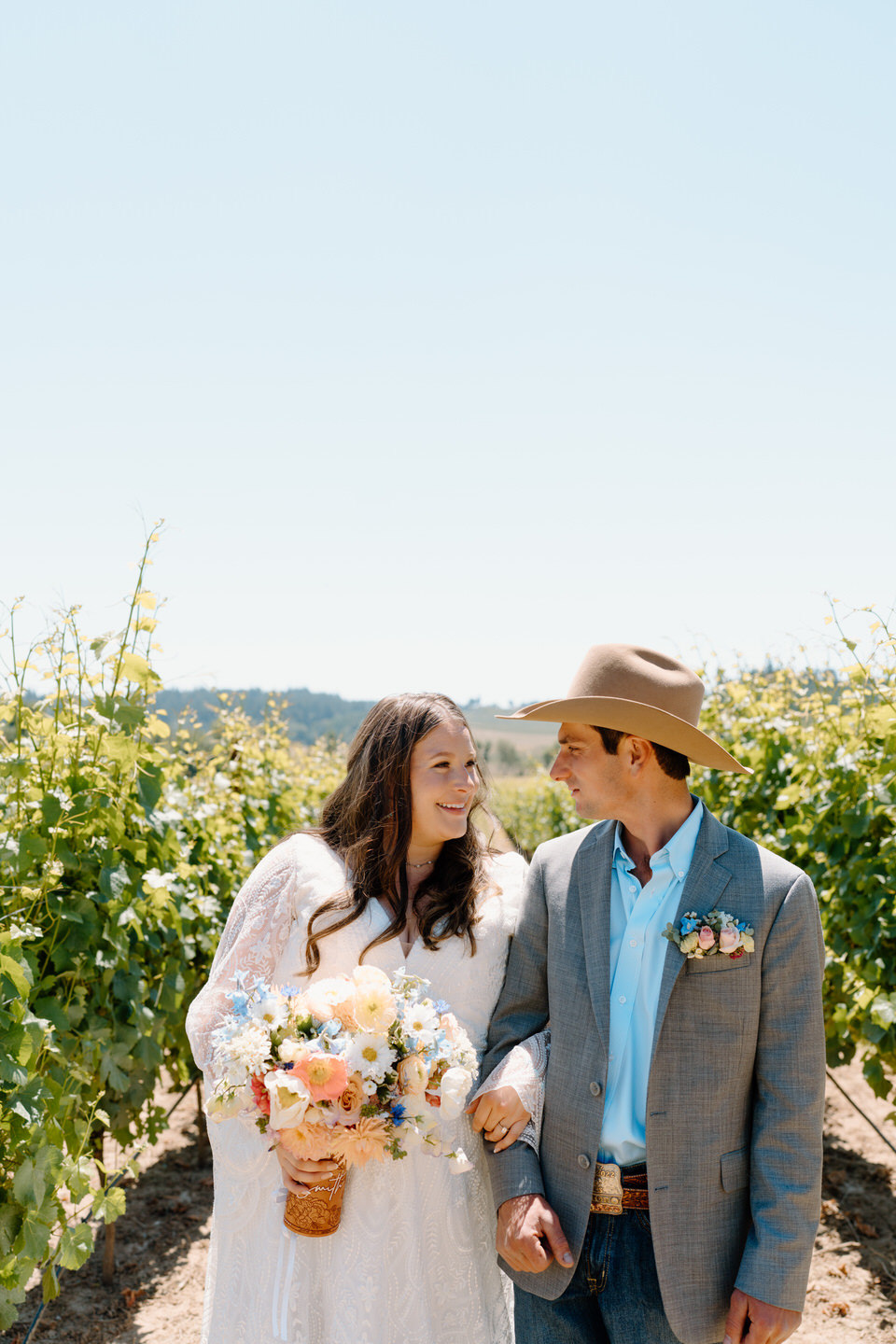 Wedding photos in the vineyard at The Farm on Golden Hill on a summer day