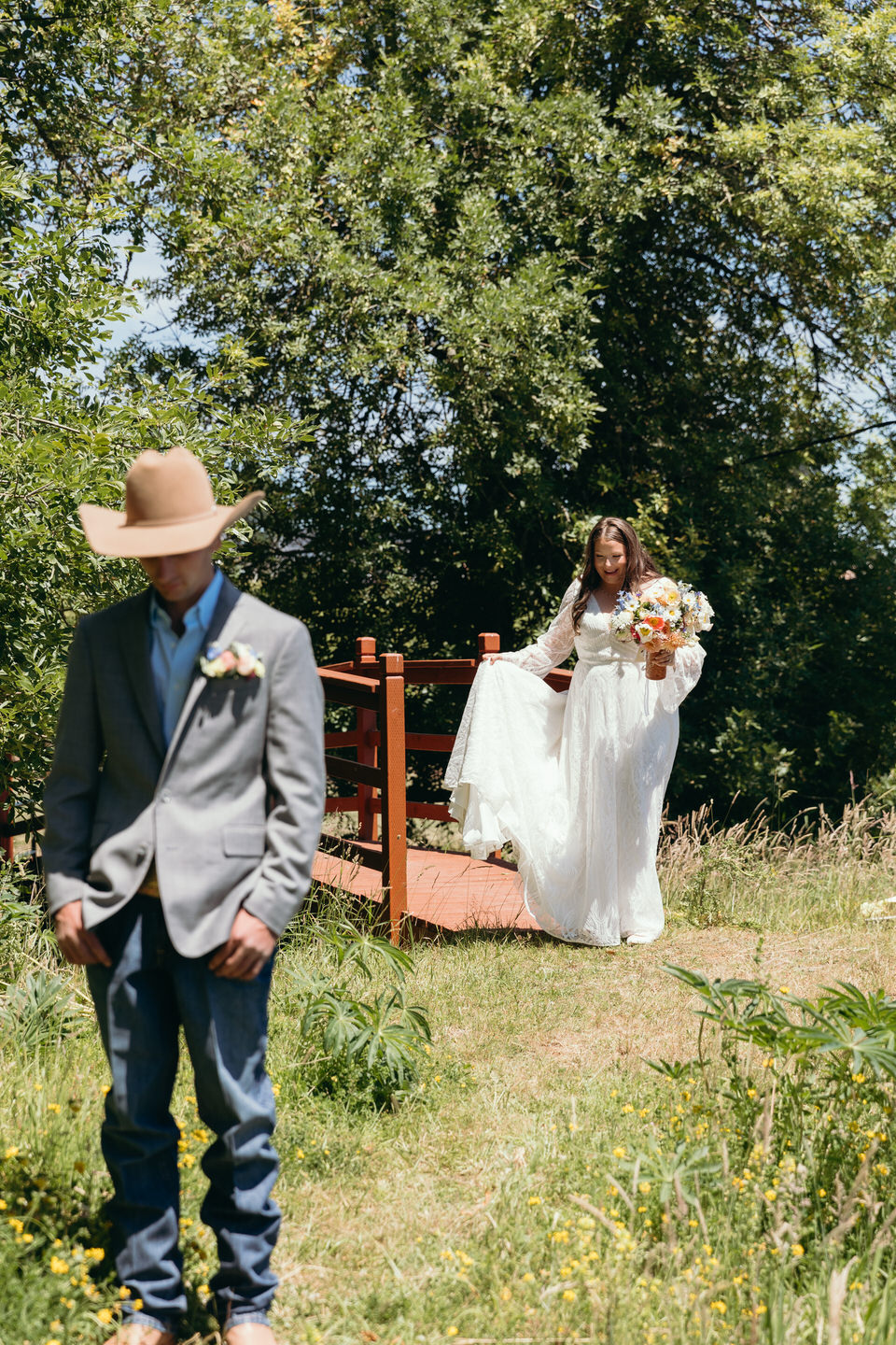 Bride approaches the groom for their first look at the Farm on Golden Hill. 