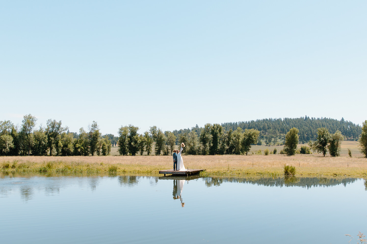 Wedding portraits on the lake at The Farm on Golden Hill