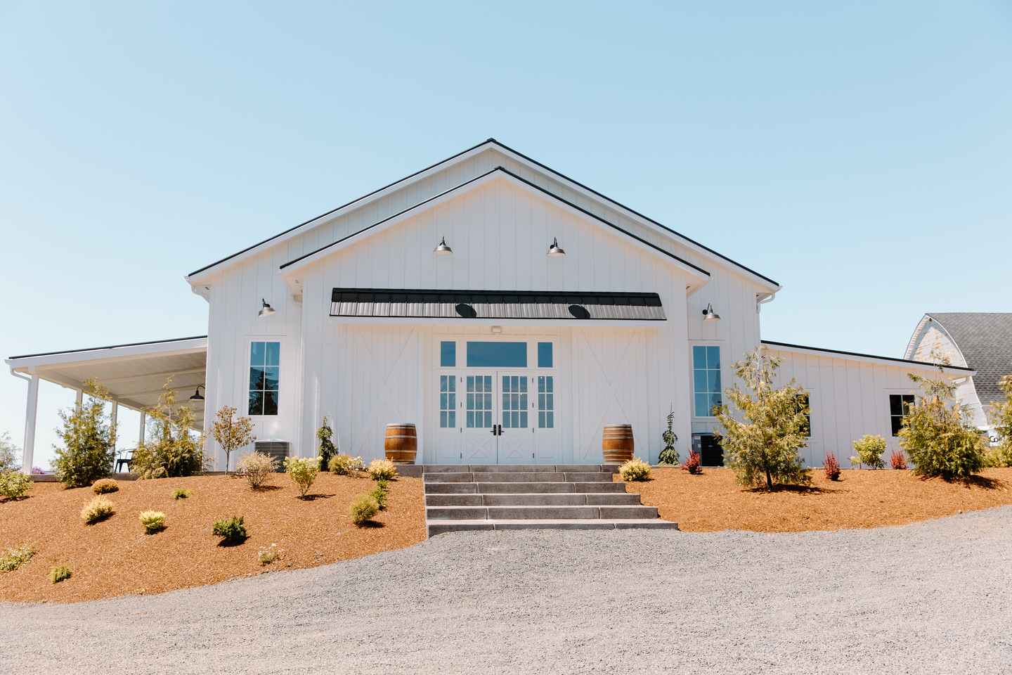 The Farm on Golden Hill wedding venue in Silverton, Oregon features a newly construction indoor space.