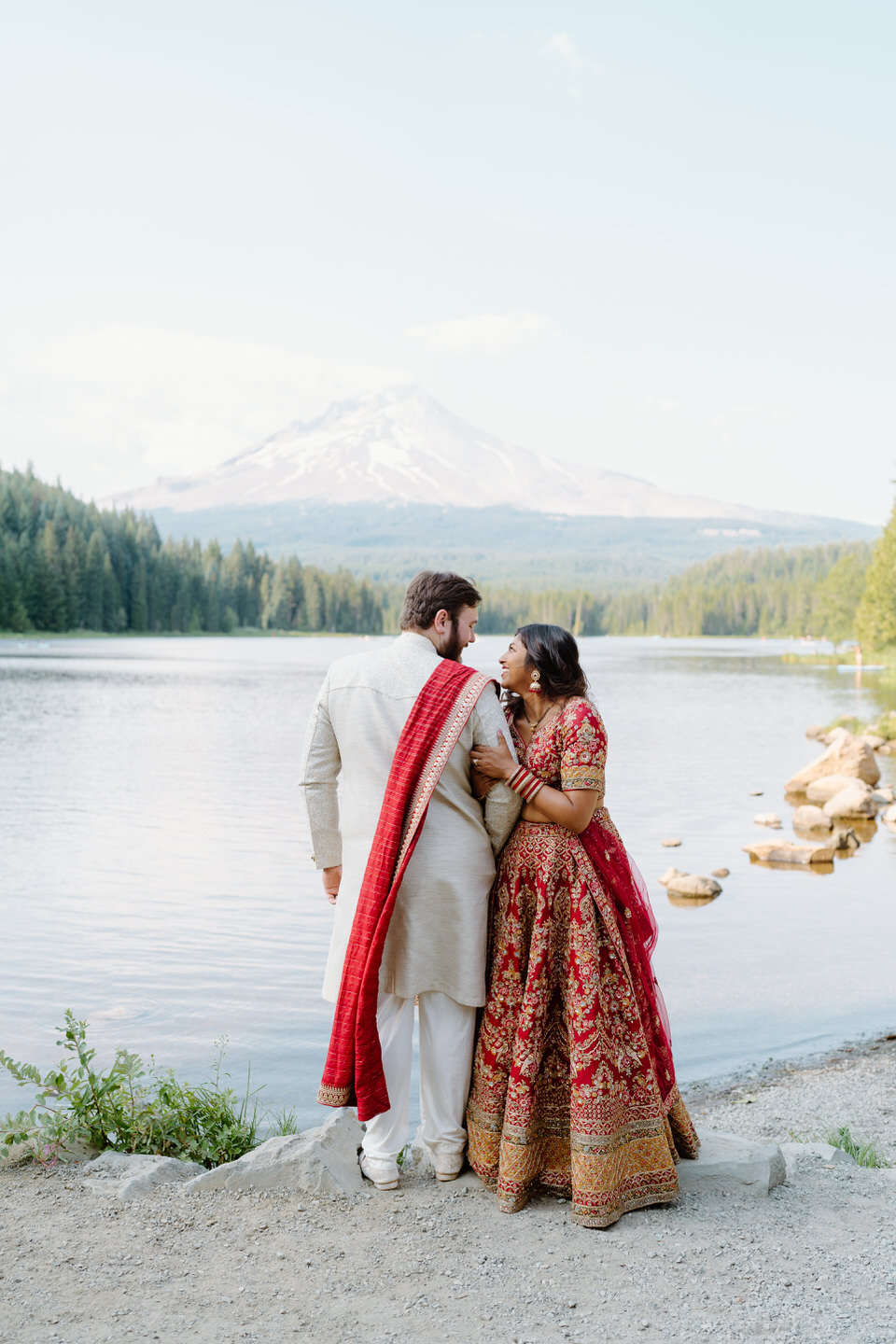 Couple in formal attire for engagement photos at Trillium Lake, Mt. Hood, Oregon