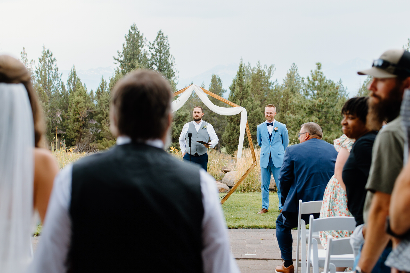 Groom's reaction to bride walking down the aisle.