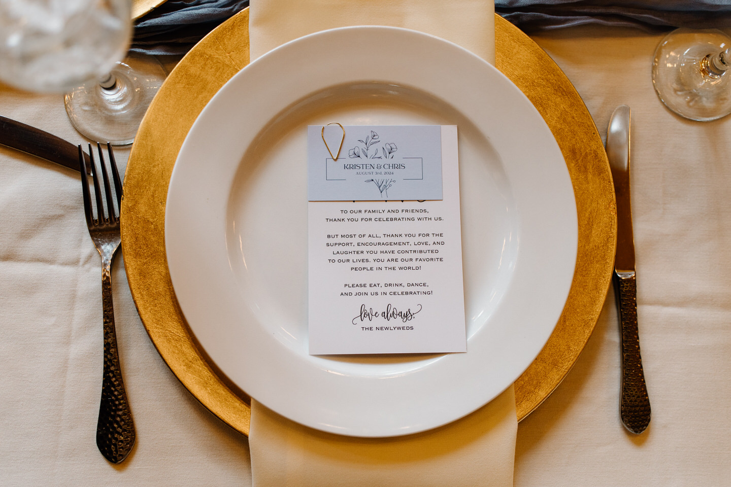 Place setting at dinner table during Aspen Lakes Golf Course wedding.