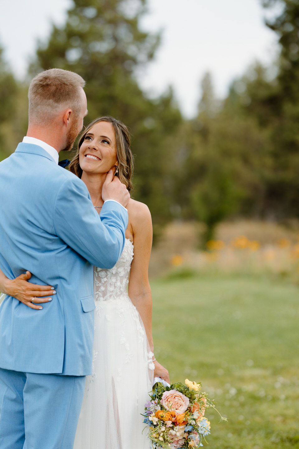 Bride and groom look at each other on wedding day.