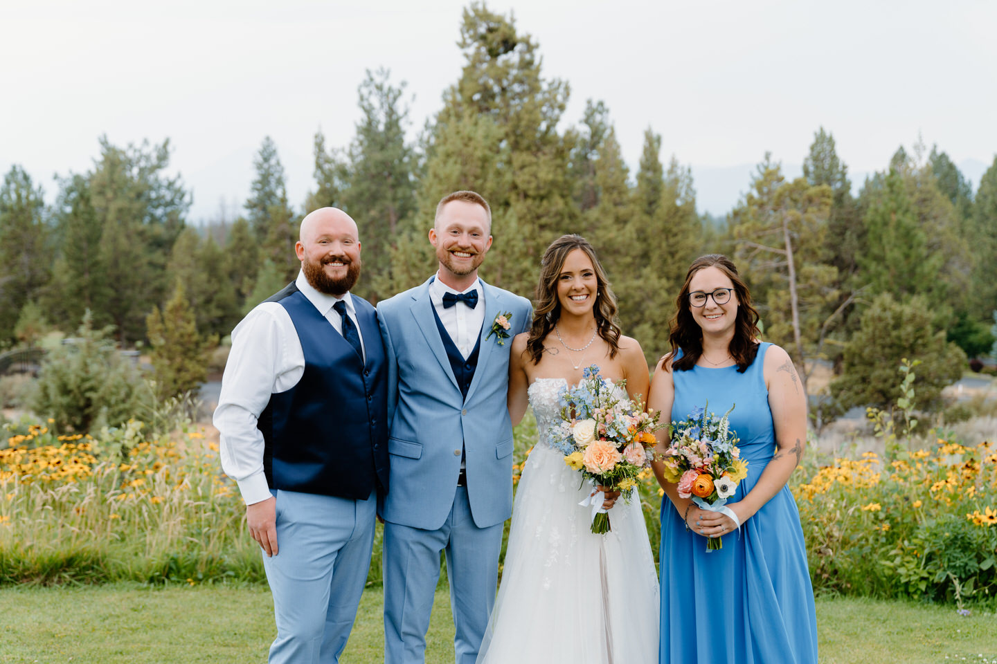 Blue bridesmaid dress and groomsmen suit for Bend, Oregon wedding.