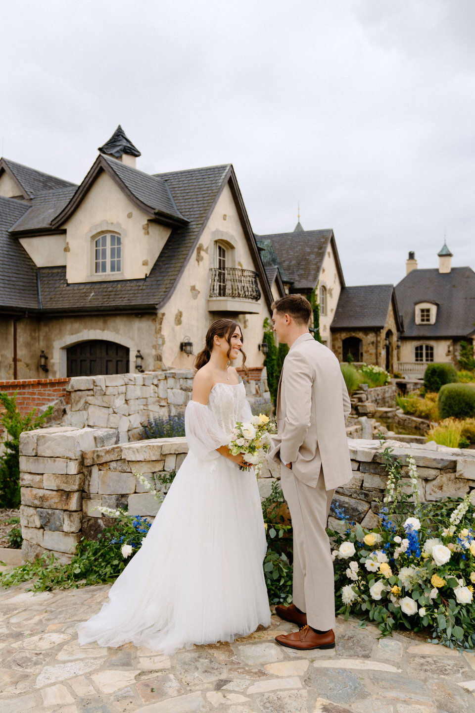 Bride and groom exchange vows during wedding at Chateau de Lis