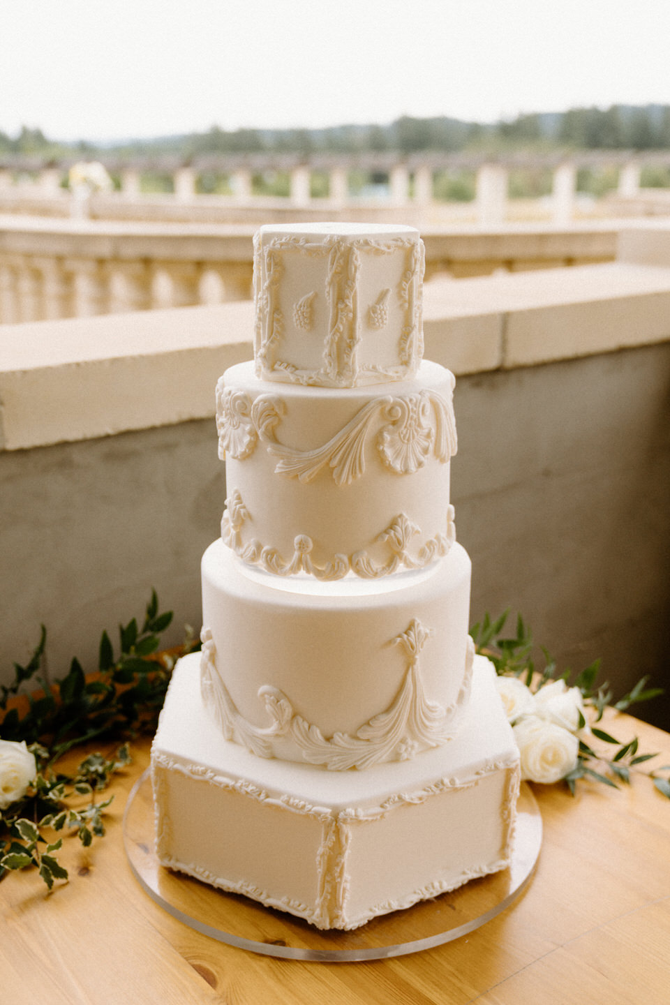 Luxury four-tier wedding cake at Chateau de Lis