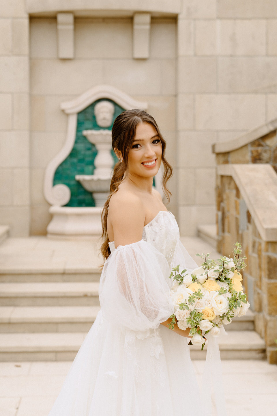 Bridal portraits with European architecture at the Chateau de Lis