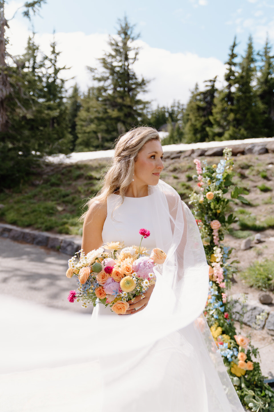 Colorful wedding flowers with long veil