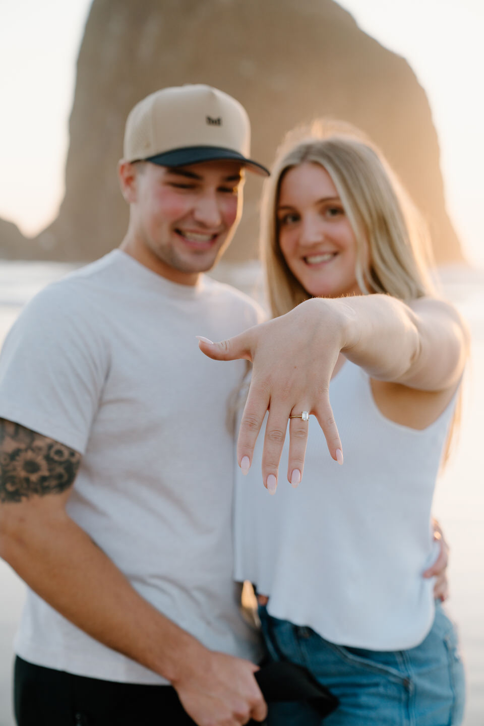 Woman shows off her engagement ring during Oregon Coast photoshoot