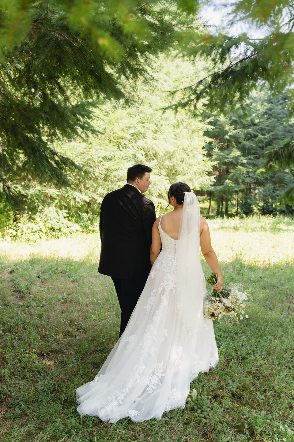 Bride and groom's couples photos at Springwater Lakes Estate