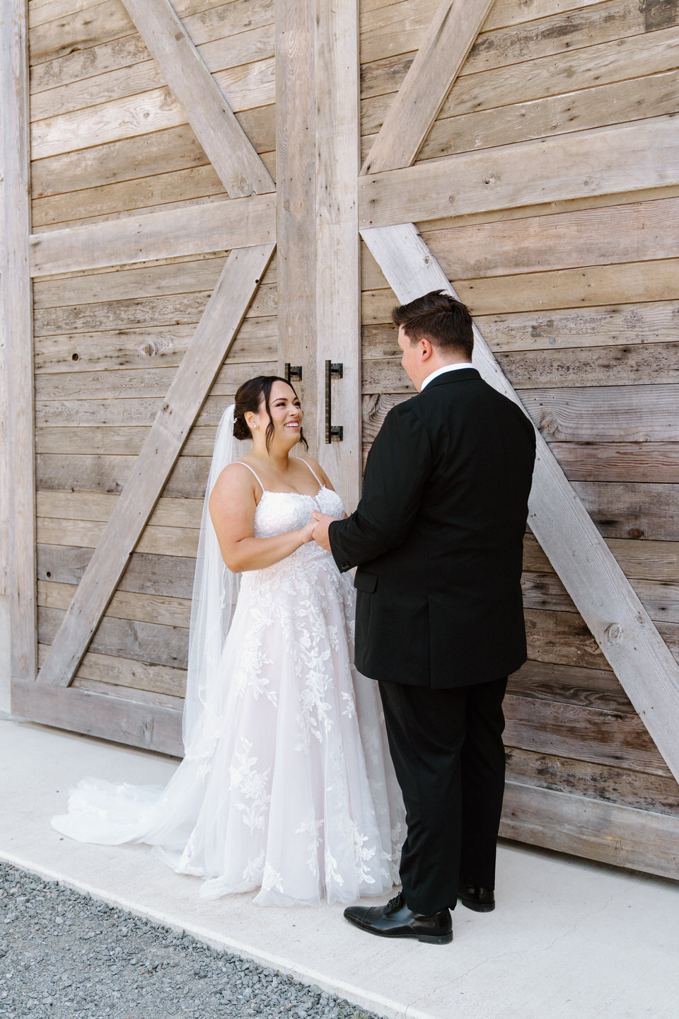 Bride and groom have their first look at Springwater Lakes Estate