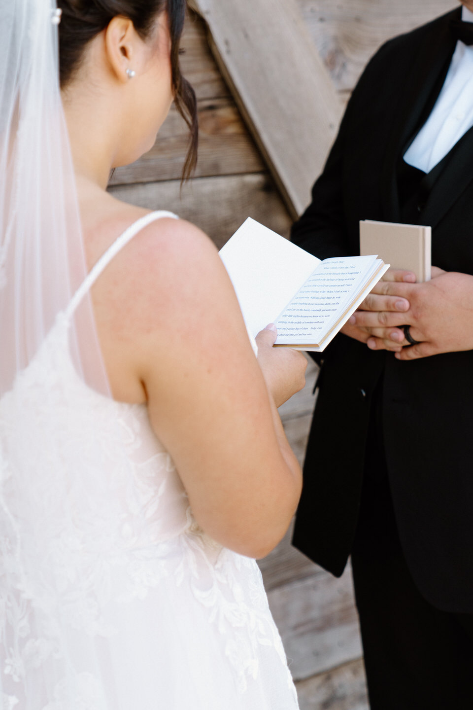 Reading private vows at Springwater Lakes Estate wedding venue