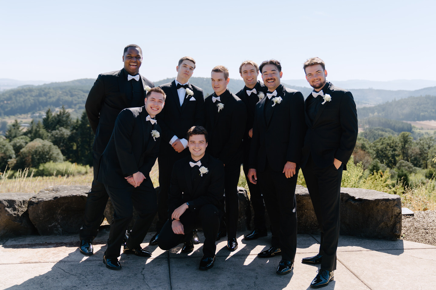 Groom and groomsmen in black suits