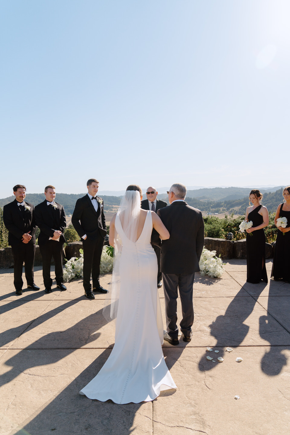 Bride walks down the aisle with her father