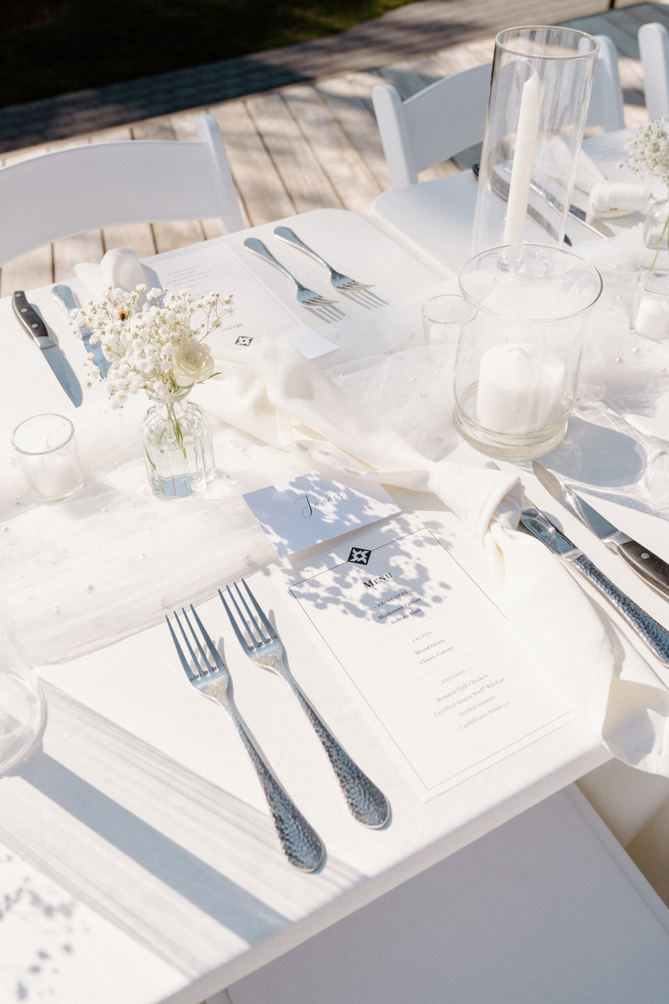 Classic white decor on a table, perfectly complementing Black Butte, Oregon's lush surroundings.