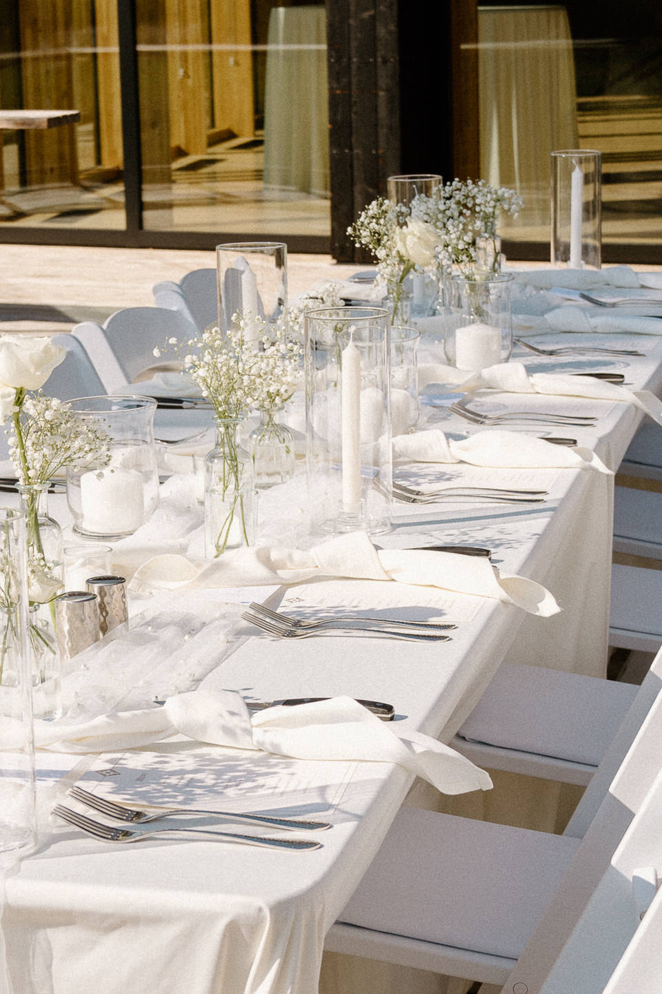 Minimalist white tablescape with clean lines, blending with the natural beauty of Black Butte, Oregon.