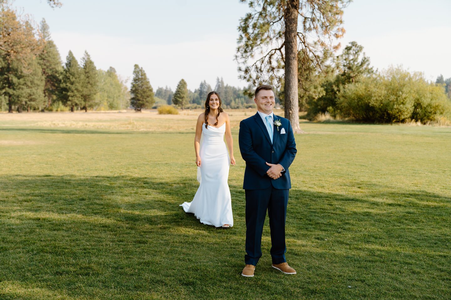 Bride and groom share a first look at Black Butte Ranch, surrounded by Central Oregon’s breathtaking natural beauty.