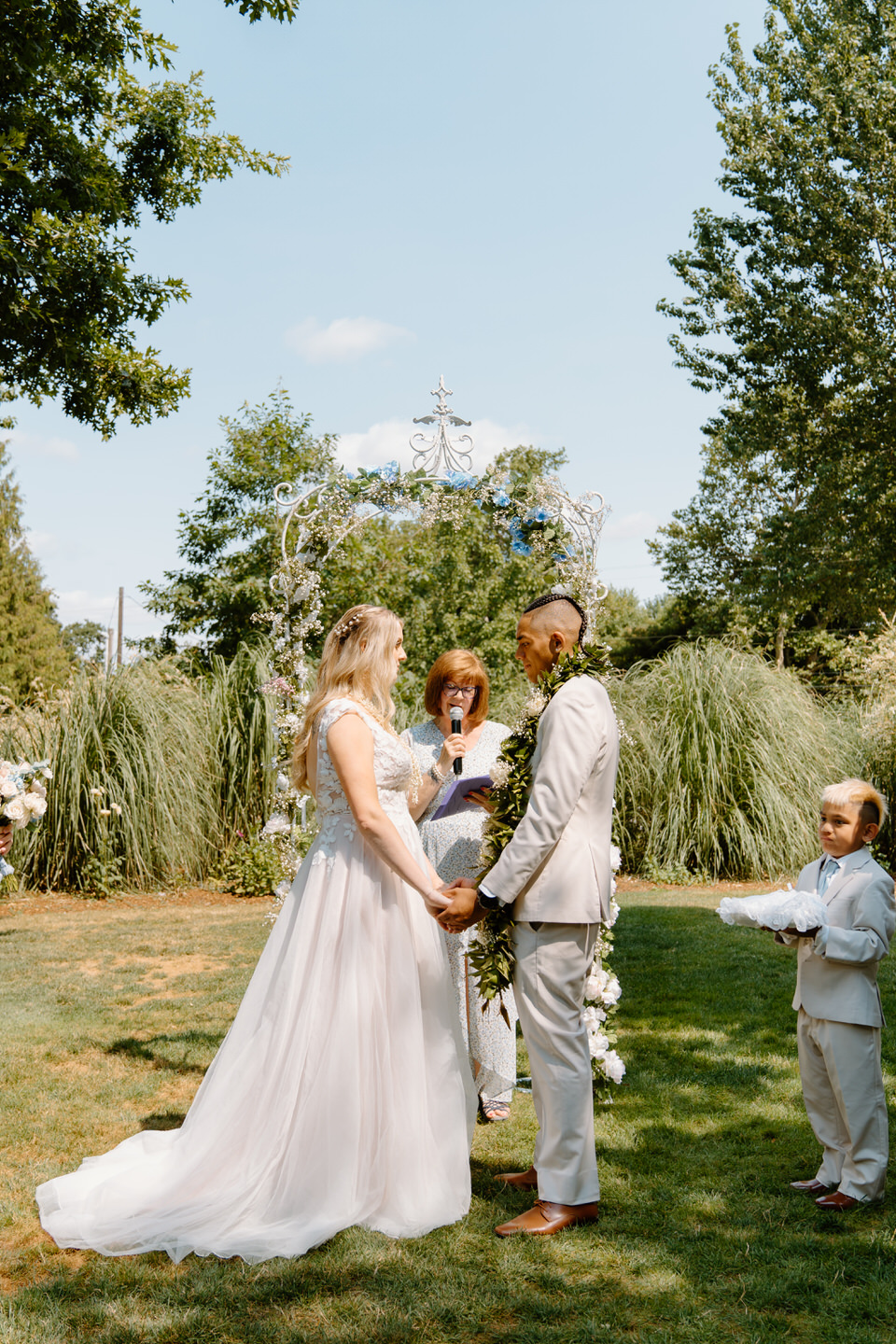 Another shot of the bride and groom standing at the altar, sharing a heartfelt moment during their wedding ceremony.