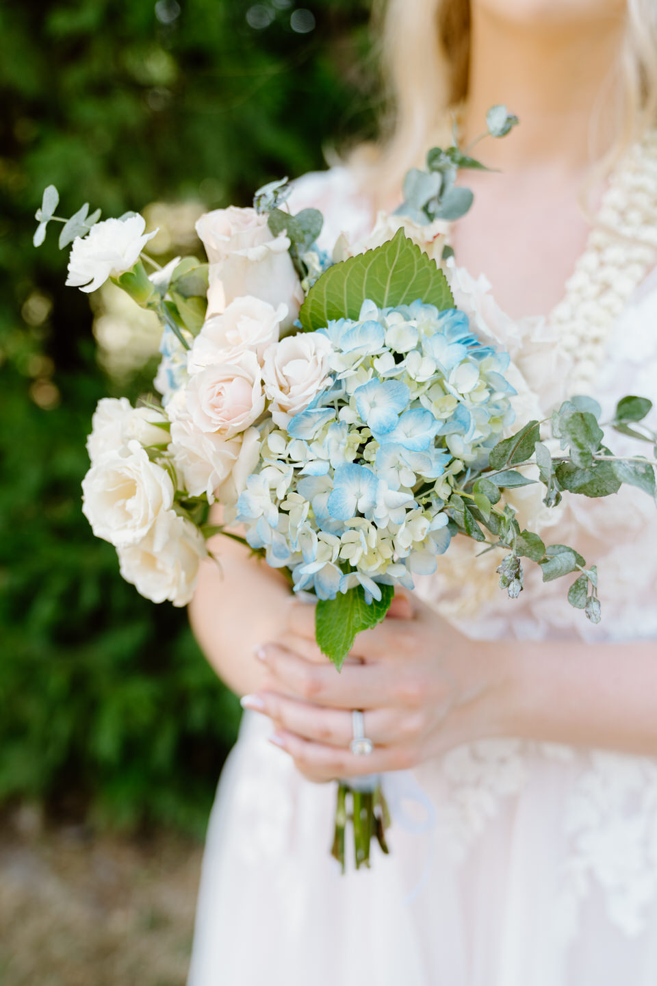 Bridal bouquet made up of hydrangeas for a July wedding