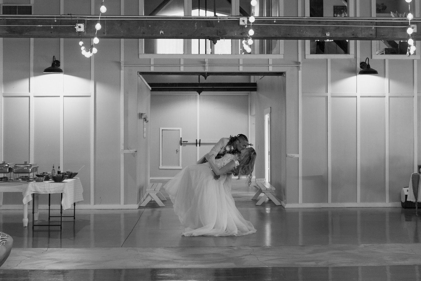 Bride and groom make their first entrance to their wedding reception.