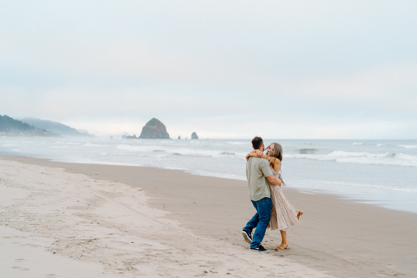 Couple hugging on the beach